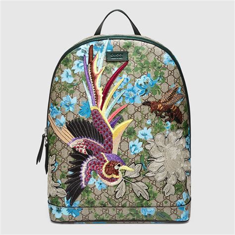 gucci embroidery applique flower backpack backpack|Gucci backpack with blue flowers.